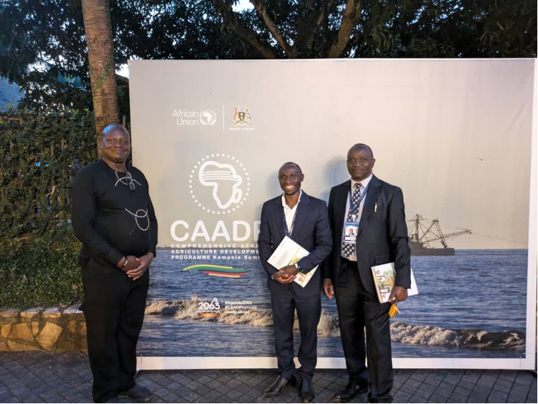 CAADP Kampala Summit – FoSCU representatives at banner