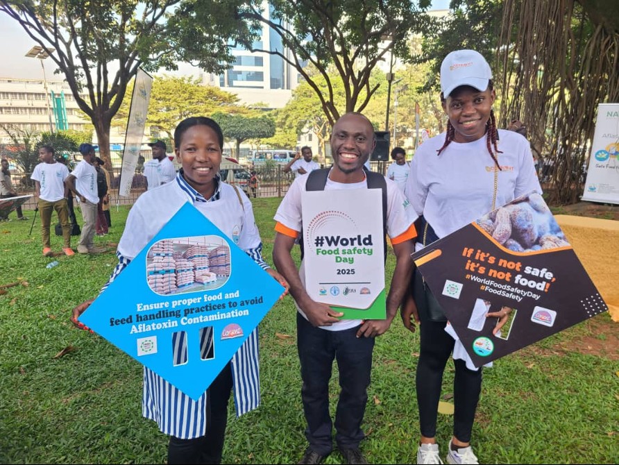 World Food Safety Day 2025 – participants with food safety signs